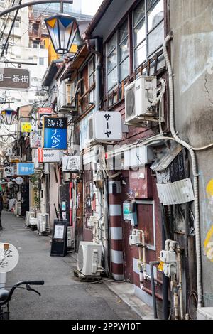 Golden Gai day time view Shinjuku Tokyo April 2023, narrow alleyways of small scruffy bars and pubs near Kabukicho red light area,Japan,Asia Stock Photo