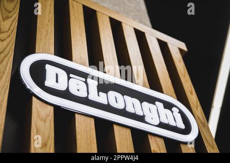 Close up on the DeLonghi logo on a decorative wall in the interior