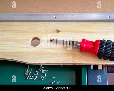 tools for furniture drawer repairing close up on workbench Stock Photo