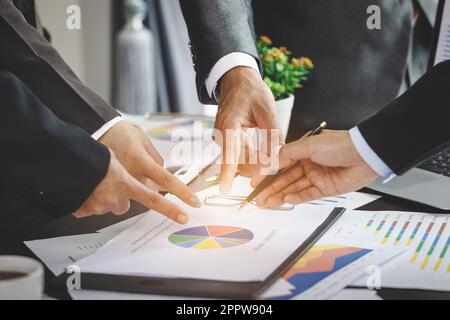 Business team analyzing income charts and graphs with modern laptop computer. teamwork, Business analysis and strategy concept. Stock Photo