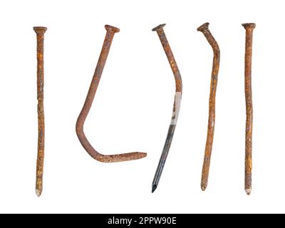 Old used and bent nails, rusted and oxidized close-up, isolated on a white background Stock Photo