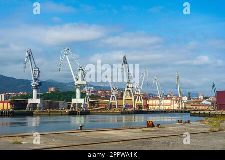 portal cranes. portal cranes in the port. cargo loading area Stock Photo