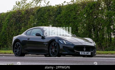 Bicester,Oxon,UK - April 23rd 2023. 2016 MASERATI GRANTURISMO travelling on an English country road Stock Photo