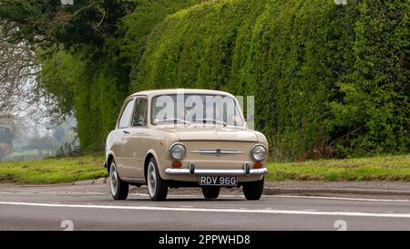 Bicester,Oxon,UK - April 23rd 2023. 1969 FIAT 850 car travelling on an English country road Stock Photo