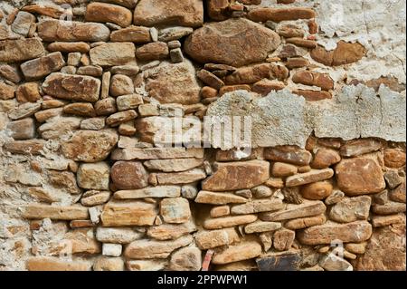 Ancient stone rough facade Stock Photo