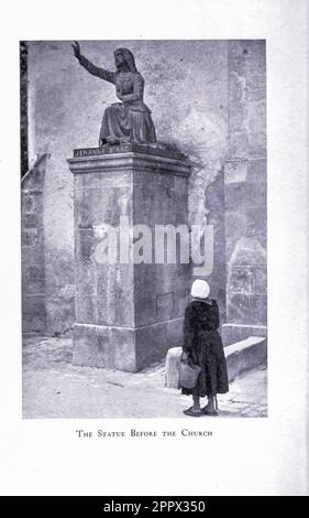 The Statue before the Church from the book ' Along French byways ' by Clifton Johnson, 1865-1940 Publication date 1907  Publisher New York The Macmillan Company Stock Photo