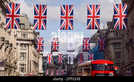 London, UK. 25th April 2023. Union Jacks decorate Regent Street as preparations for the coronation of King Charles III and Queen Camilla, which takes place on May 6th, continue around London. Credit: Vuk Valcic/Alamy Live News Stock Photo
