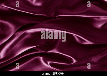 Silk fabric, abstract wavy vinous satin fabric background Stock Photo