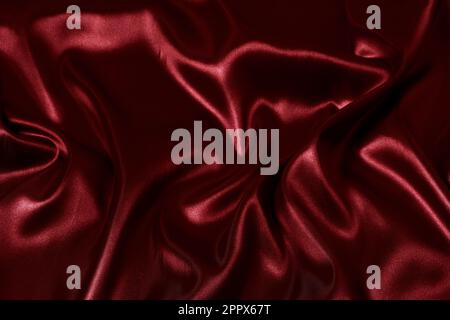 Silk fabric, abstract wavy red satin fabric background Stock Photo