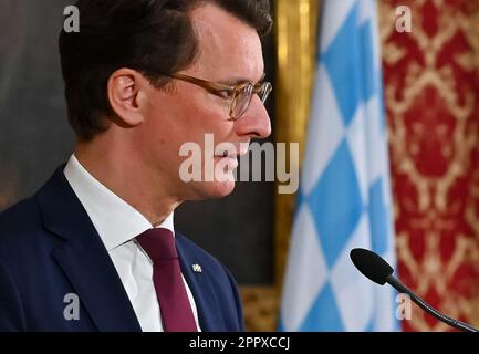 Munich, Germany. 25th Apr, 2023. Hendrik Wüst (CDU), Minister President of North Rhine-Westphalia, attends a press conference after a joint cabinet meeting of Bavaria and NRW. Credit: Jacqueline Melcher/dpa/Alamy Live News Stock Photo