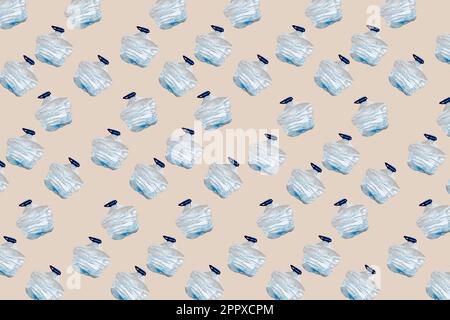 a mosaic of some smashed plastic bottles on a beige background Stock Photo