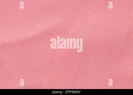 Pink linen pastel fabric texture as background. Stock Photo