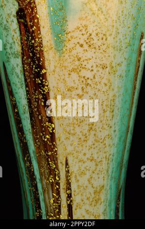 Stem of glass table lamp created by hand by glass-blower Jean-Michel Operto in Biot, Provence-Alpes-Côte d’Azur, France Stock Photo