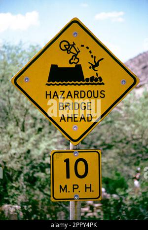 United States. Arizona. Hazardous Bridge road sign at Sabino Canyon. Stock Photo