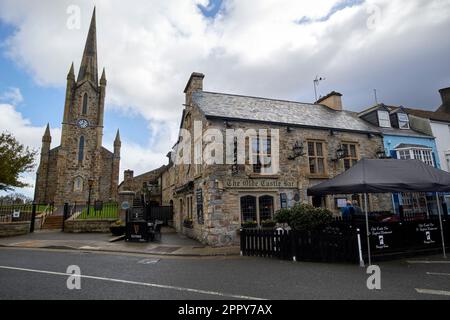 church of ireland church and the olde castle bar donegal town county donegal republic of ireland Stock Photo