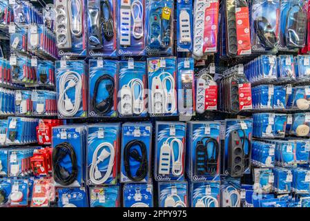 Carmagnola, Turin, Italy - April 24, 2023:European power sockets, extension cable, domestic socket and power plug packaged for sale in Italian DIY sup Stock Photo