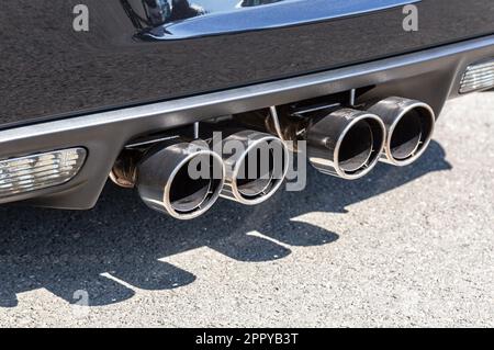 Samara, Russia - June 26, 2022: Exhaust pipes of a power sport car Stock Photo