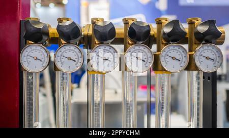 Flowmeter, rotameter - flow regulator for cooling system of injection machine Stock Photo