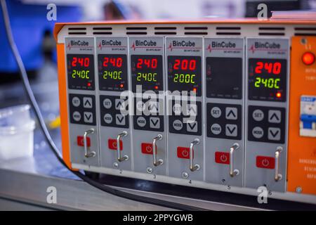 Bincube developed hot runner mold temperature control card and box Stock Photo