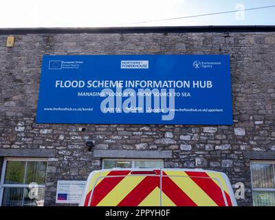 A sign about new flood defences being built on the River Kent in Kendal, Cumbria, UK. Stock Photo