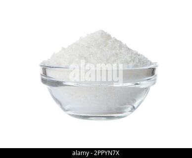 Coconut flakes in a glass bowl isolated on white. Stock Photo