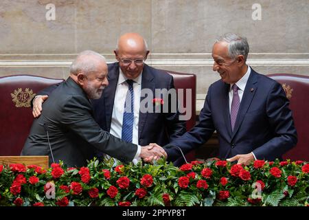 Lisbon, Portugal. 25th Apr, 2023. Luiz Inacio Lula da Silva, Brazil's President, (L) greets Augusto Santos Silva, President of the Portuguese Parliament, (C) and Portuguese President, Marcelo Rebelo de Sousa (R) during last day of official State Visit to Portugal. Credit: SOPA Images Limited/Alamy Live News Stock Photo