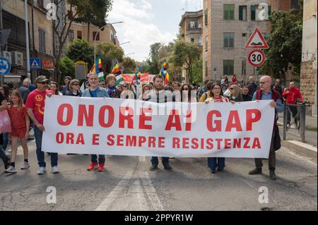 April 25, 2023, Rome, Italy: Thousands of people, associations and even representatives of political parties participated on 25/4/2023 in the demonstration called by the National Association of Partisans of Italy (ANPI) to commemorate the Liberation from the Nazi-fascists and the many who died for having participated in the Resistance. Arrival at Porta San Paolo, which together with other places in Rome was the scene of clashes between a part of the Roman population of every order and rank and the German troops who had occupied Rome. Many interventions, from the provincial president of the ANP Stock Photo