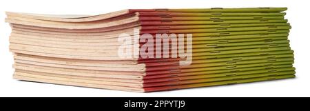 stack of paperback thin books or booklets isolated on white background, selective focus cut out Stock Photo