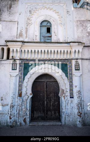 Entrance door to an old house in the medina of Larache. Stock Photo