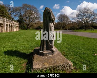 Dante, headless marble statue in Crystal Palace Park. First recorded in the park in 1864. 3/4 over shoulder angle of full length figure and park. Stock Photo