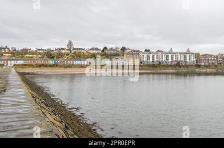 The waterfront of Granton across Granton Harbour from the Eastern Breakwater, North Edinburgh, Scotland. Stock Photo