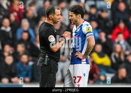 Referee Tim Robinson speaks to Lewis Travis #27 of Blackburn Rovers during the Sky Bet Championship match Blackburn Rovers vs Burnley at Ewood Park, Blackburn, United Kingdom, 25th April 2023  (Photo by Craig Thomas/News Images) Stock Photo