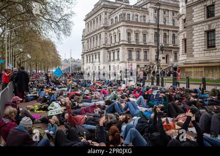 Protesters stage a “die-in” in London, England, on Earth Day, Saturday, April 22. Part of a 4-day campaign, organised by Extinction Rebellion. Stock Photo