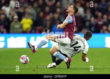 Aston Villa's Alex Moreno is tackled by Fulham's Bobby Decordova-Reid during the Premier League match at Villa Park, Birmingham. Picture date: Tuesday April 25, 2023. Stock Photo