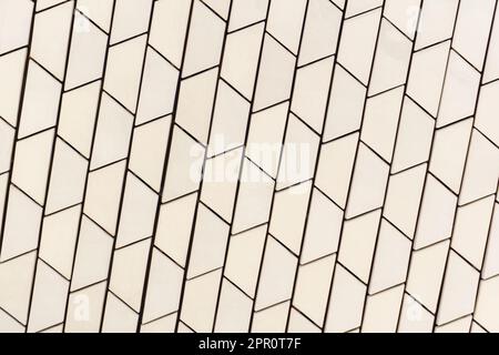 Angled white tile pattern perspective close up background Stock Photo