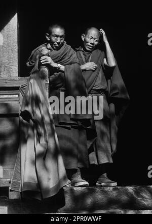 Tibetan monks in a doorway Tashilhunpo Monastery - Shigatse, Tibet Stock Photo