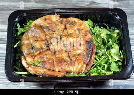 Traditional Egyptian dish Hawawshi, pita stuffed with minced meat and spiced with onions, pepper, parsely and chilies, baked by filling flat Egyptian Stock Photo