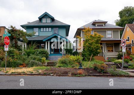 Houses with sustainable, native plant landscaping and pollinator gardens instead of lawns in Portland, Oregon. Stock Photo