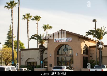 Chowchilla, California, USA - April 18, 2023: Late afternoon sunlight shines on the downtown Chowchilla City Hall. Stock Photo