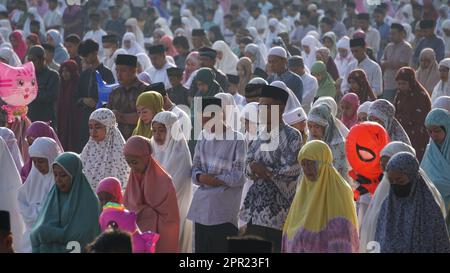 Muslims in the field pray Idul Fitri in the morning. Stock Photo