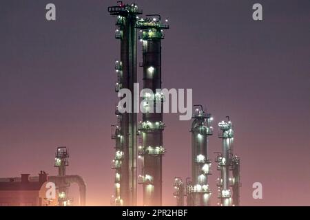 Chemical installation - part of a big oil refinery at night Stock Photo