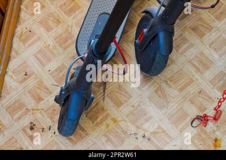 Two rubber wheels with tires round from the new modern scooter. Stock Photo