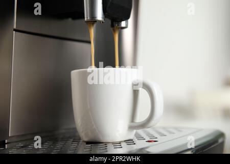 Espresso Machine Pouring Coffee Cups Blurred Background Closeup