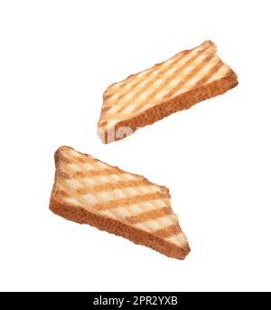 Delicious toasted bread flying on white background Stock Photo