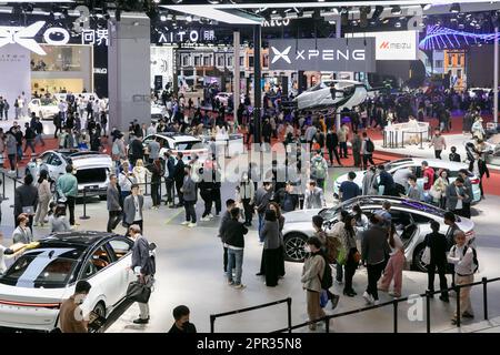 Shanghai, China. 25th Apr, 2023. People visit the 20th Shanghai International Automobile Industry Exhibition in Shanghai, east China, April 25, 2023. The exhibition, also known as Auto Shanghai 2023, is the first A-class international auto show held in China since the country adjusted its COVID-19 response. With 13 indoor exhibition halls, it boasts an exhibition area of more than 360,000 square meters. Credit: Wang Xiang/Xinhua/Alamy Live News Stock Photo