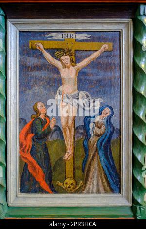 Crucifixion scene, detail of the pulpit of Sankt Ols Kirke, English Sankt Olaf's Church, in the village of Olsker, Bornholm Island, Denmark. Stock Photo