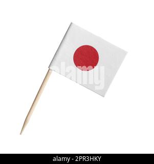 Small paper flag of Japan isolated on white Stock Photo