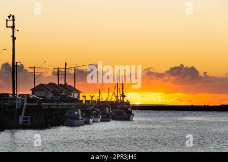 Fishing boats moored alongside Holmes Wharf, Oamaru harbour, North Otago, South Island, New Zealand Stock Photo