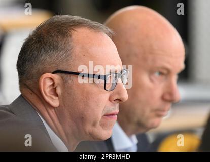 Dresden, Germany. 26th Apr, 2023. Jörg Urban (l), Chairman of the AfD Saxony, and Jan Zwerg, Parliamentary Secretary of the AfD Saxony, follow the Saxon Minister for Europe's specialist government statement on 'Developing the Future Together - Saxony's Contribution to the Global South' during the session of the Saxon Parliament. Credit: Robert Michael/dpa/Alamy Live News Stock Photo