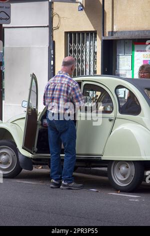Paris, France - September 23, 2017: Old Citroen and owner, side view Stock Photo